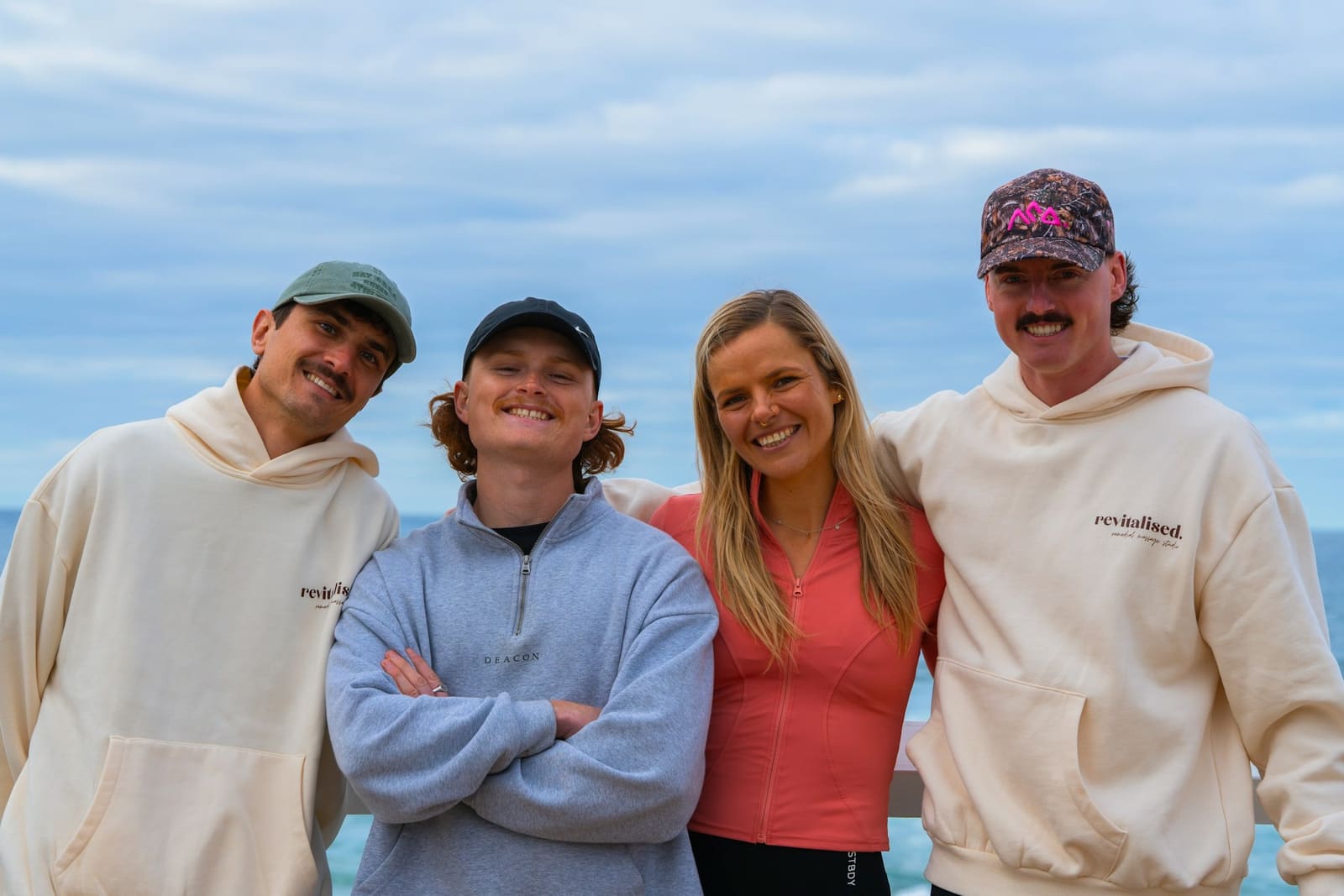The four Motion Four Justice runners together on the coast before setting out